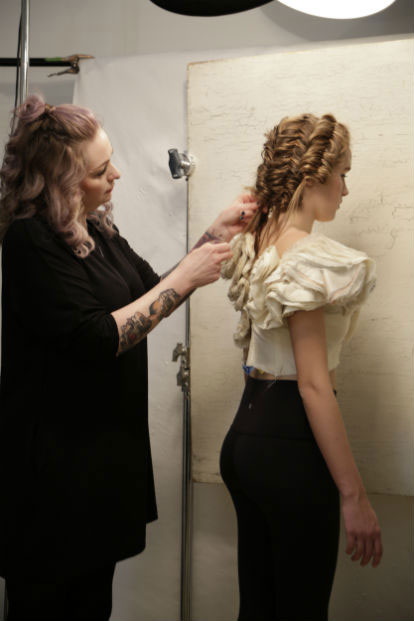 Sarah with her model before the final shot is taken, as seen at the top of this story. | Source: Aveda
